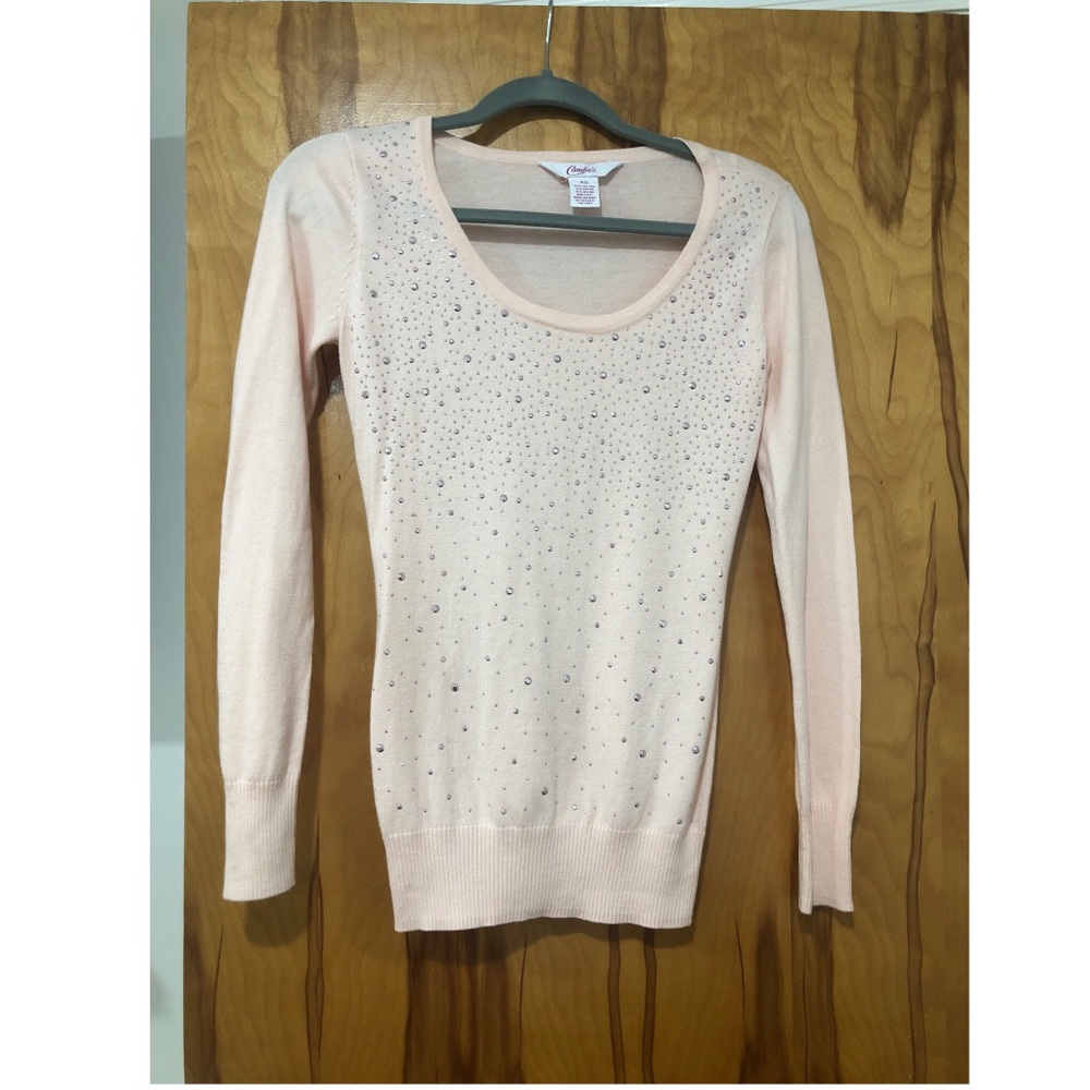 Cute pink sweater!